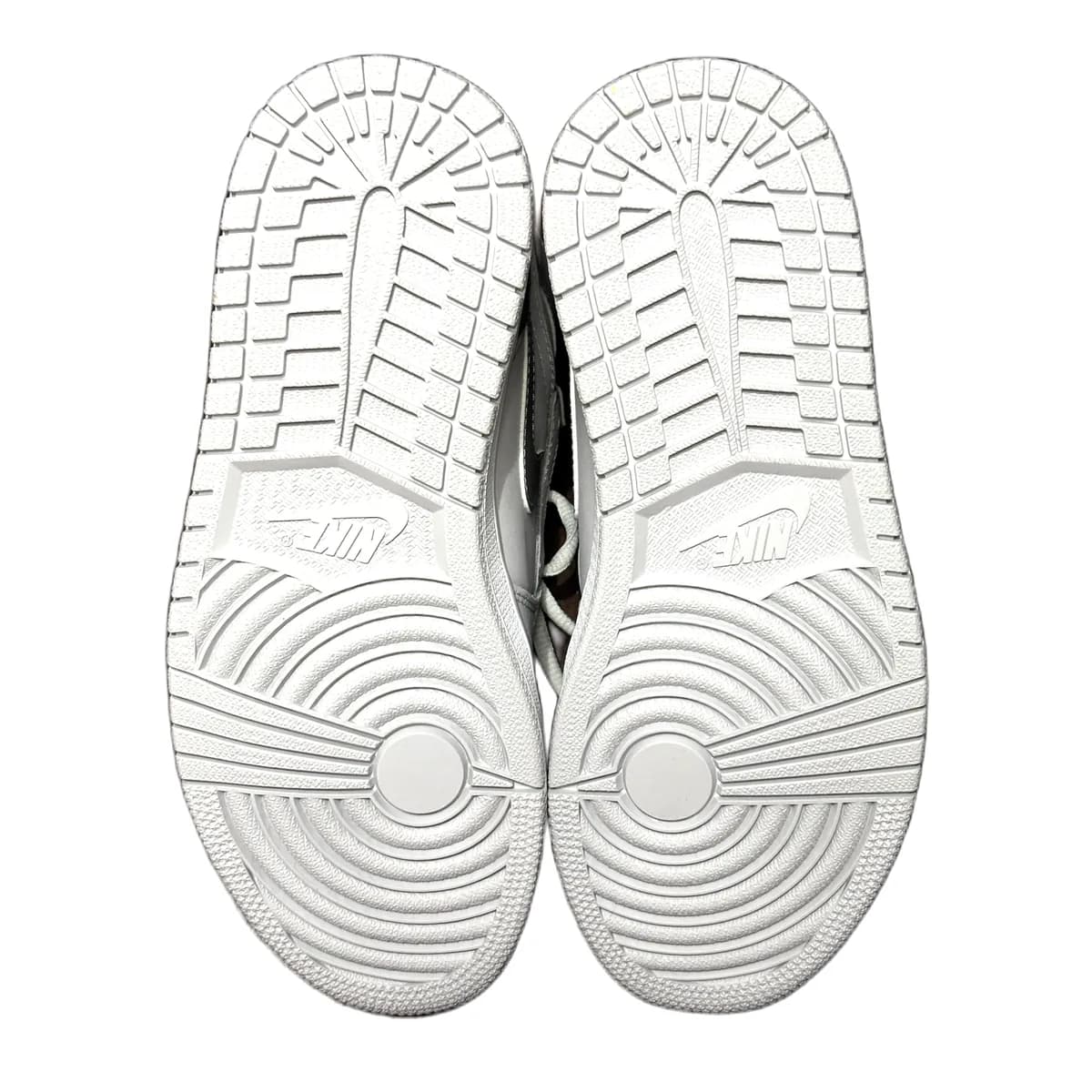 Sample photo 11, Outsole: the outsoles of both shoes side by side